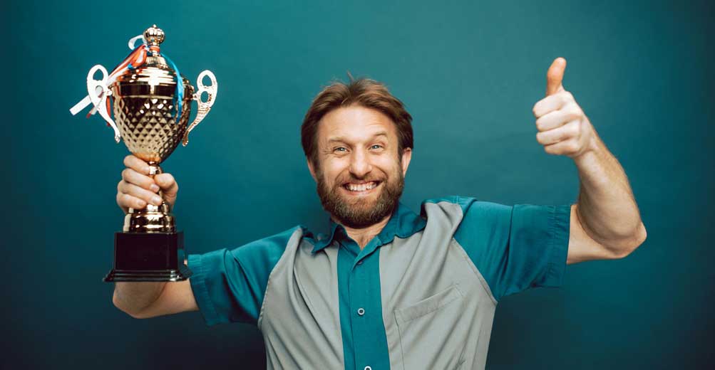 happy man winner thumbs up